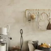 Ferm Living Curvature hushållspappershållare Svart mässing